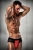 Passion 007 Thong - Мужские трусики с красным гульфиком, L/XL (чёрные с красным) Passion 007 Thong - Мужские трусики с красным гульфиком, L/XL (чёрные с красным)