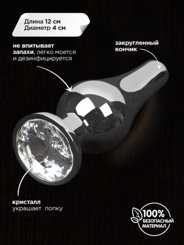 Пикантные Штучки - Серебристая анальная пробка с кристаллом, 12Х4 см (изумрудный)