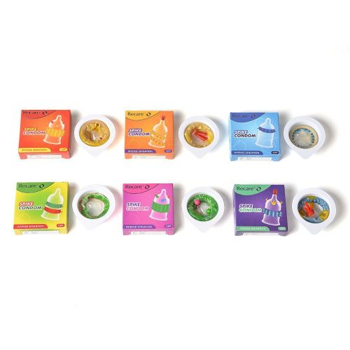 Насадка на член Recare Spike Condom Pink (с шариками и рядами шипов)